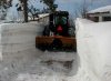 snowbankandtractorinfrontyard.jpg