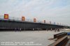 100-axle-lines-CHINAHEAVYLIFT-SPMT-assist-3200t-giant-bridge-section-roll-onto-the-barge-2.jpg