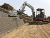 Heavy Equipment is essential to move the wall  blocks.jpg