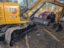 Removing_the_old_track_CAT_305_5E2.jpg