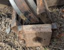 CAT_305_5E2_idler_missing_bolts.jpg