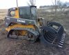 332d skidsteer and grotrian grapple.jpg