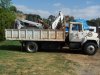 Copy of Holds skidsteer along with bachhoe attachment and buckets and hammer and forks..jpg